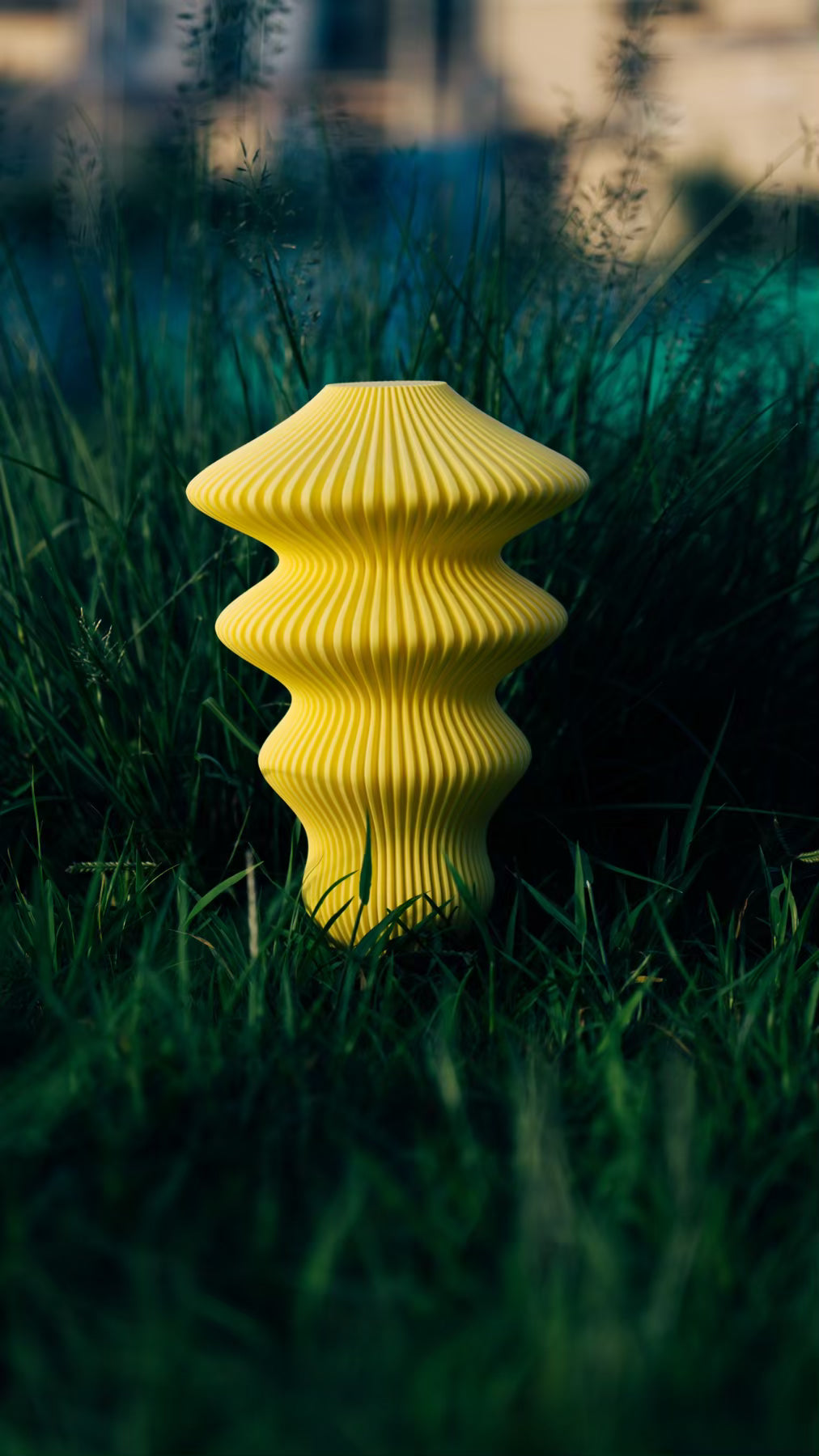 Muvèlo Ruvaa Max Butter portable rechargeable table lamp with a sculptural ribbed form.