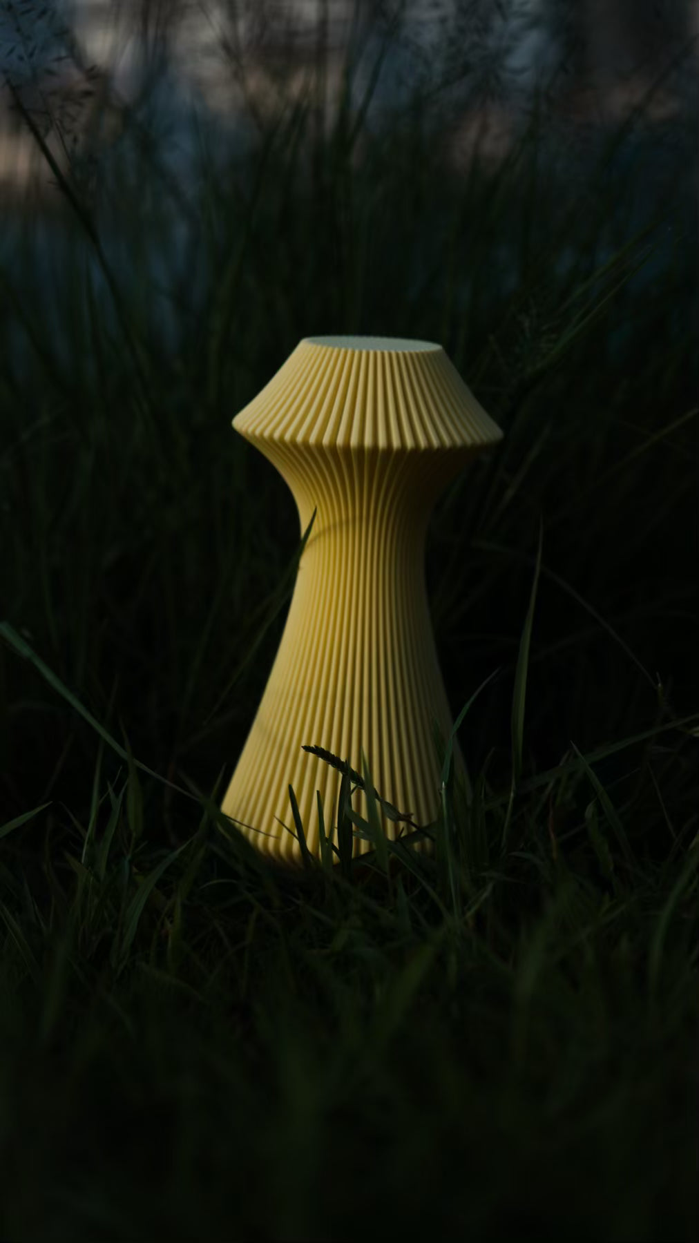 Muvèlo Volara Butter portable ambient table lamp displayed as sculptural decorative lighting.