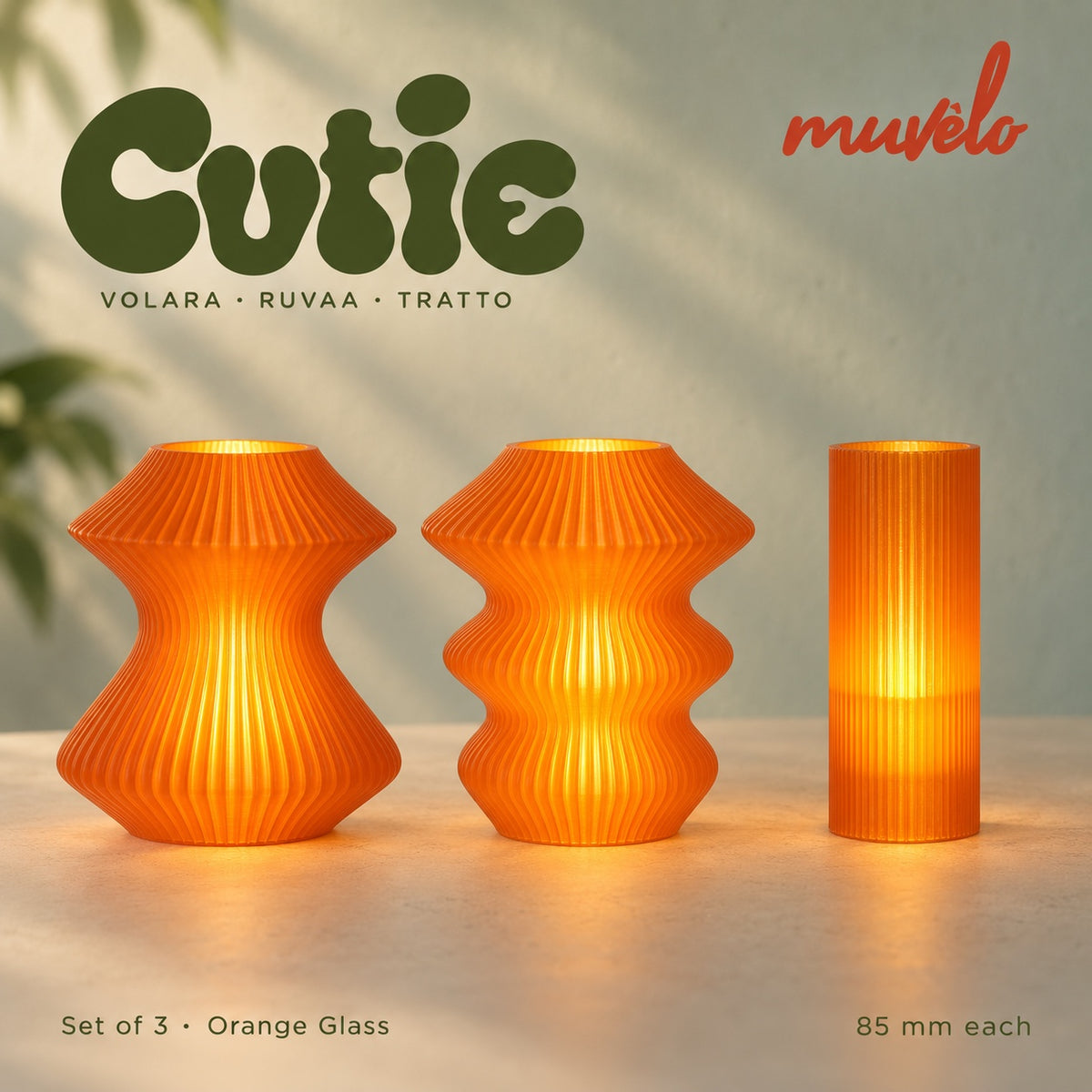 Muvèlo Cutie set of three in Orange Glass: Volara, Ruvaa, Tratto, all illuminated and shown together.