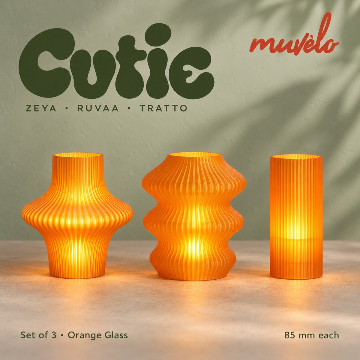 Muvèlo Cutie set of three in Orange Glass: Zeya, Ruvaa, Tratto, all illuminated and shown together.