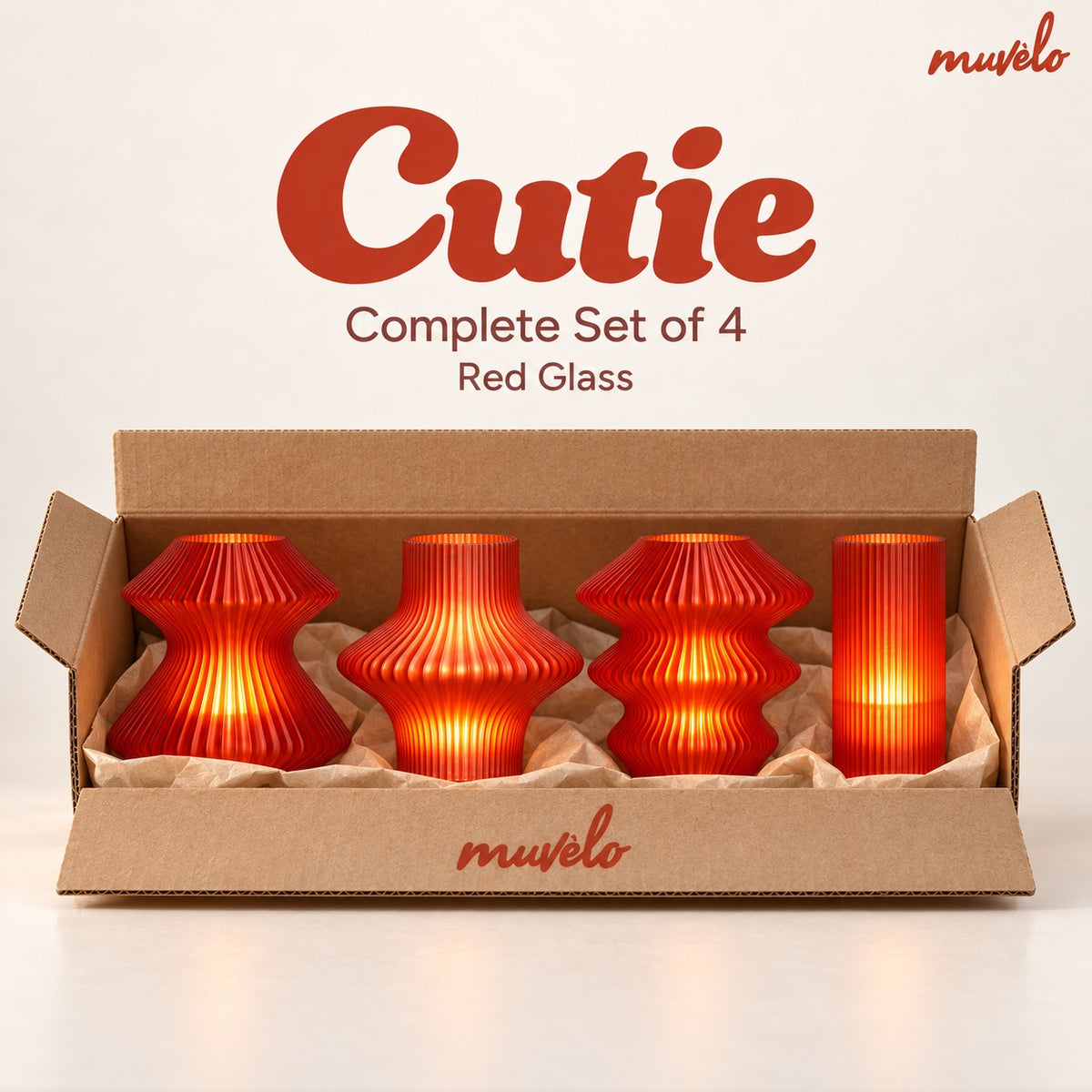 All four Cutie mini lamps in Red Glass, shown together in their box.