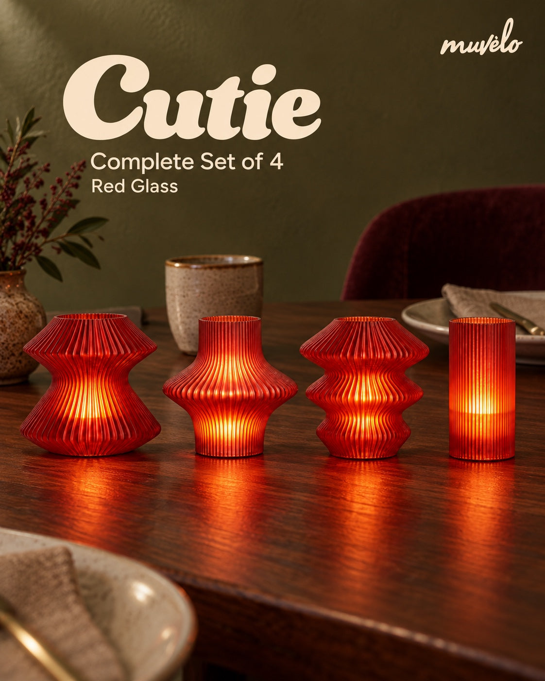 Cutie Red Glass Complete Set of 4 glowing on a dining table: Volara, Zeya, Ruvaa and Tratto.