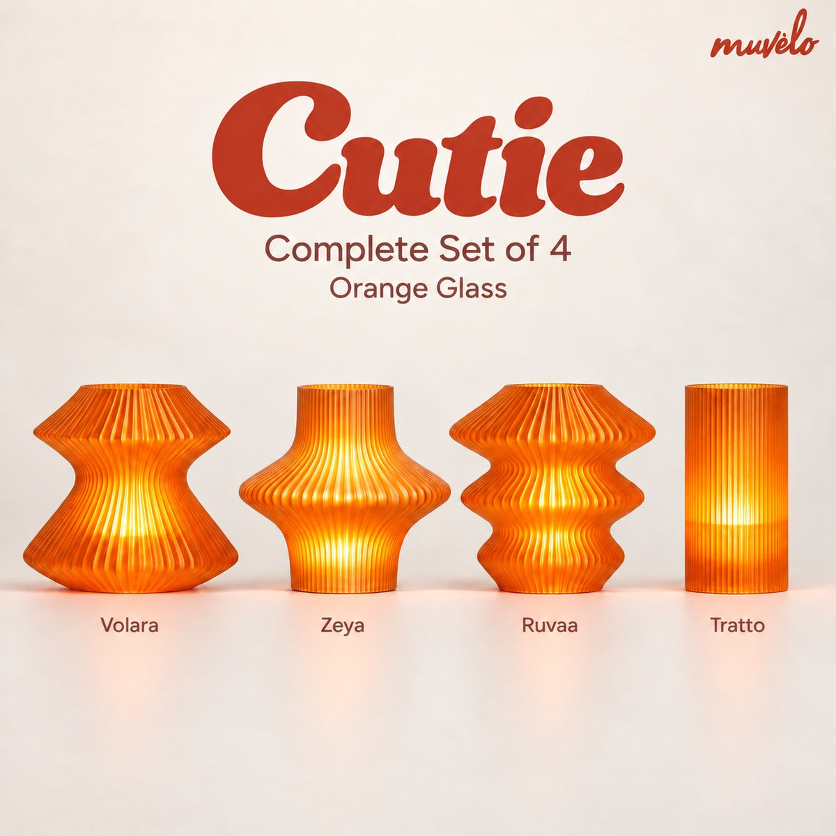 Muvèlo Cutie Complete Set of 4 in Orange Glass: Volara, Zeya, Ruvaa and Tratto, all illuminated.