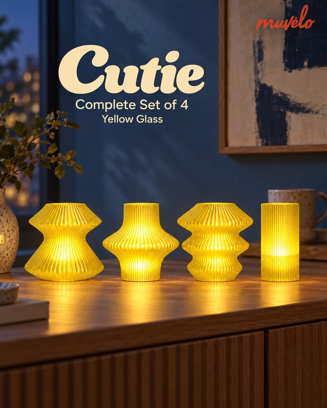 Cutie Yellow Glass Complete Set of 4 glowing on a blue-hour console: Volara, Zeya, Ruvaa and Tratto.