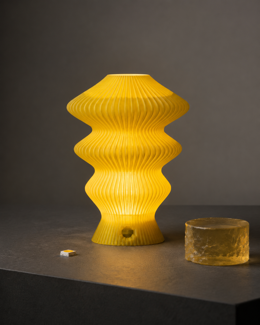 Yellow Muvèlo Ruvaa Mono 1W ambient table lamp in an editorial product study
