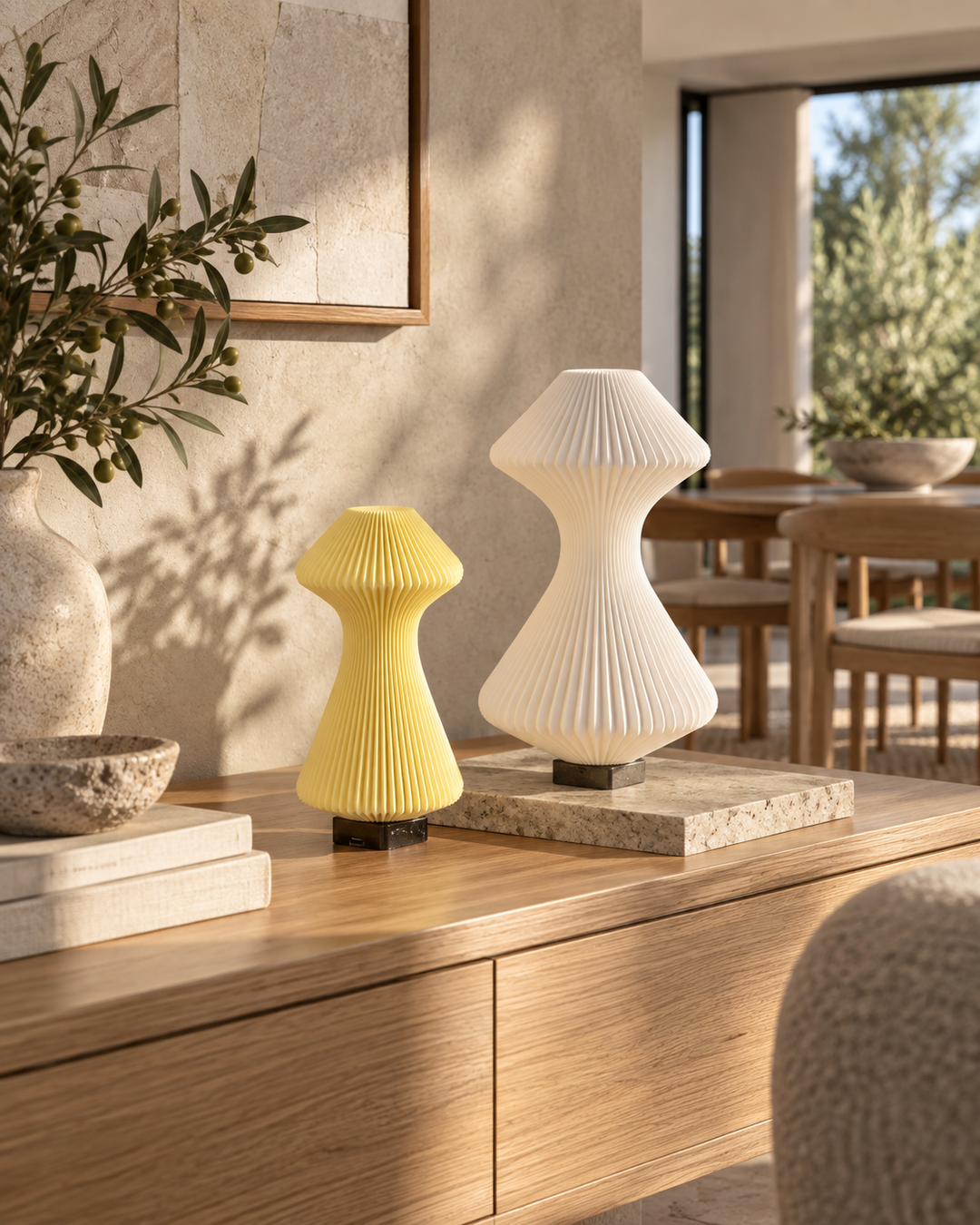 Volara and Volara Max portable lamps compared on a wooden console
