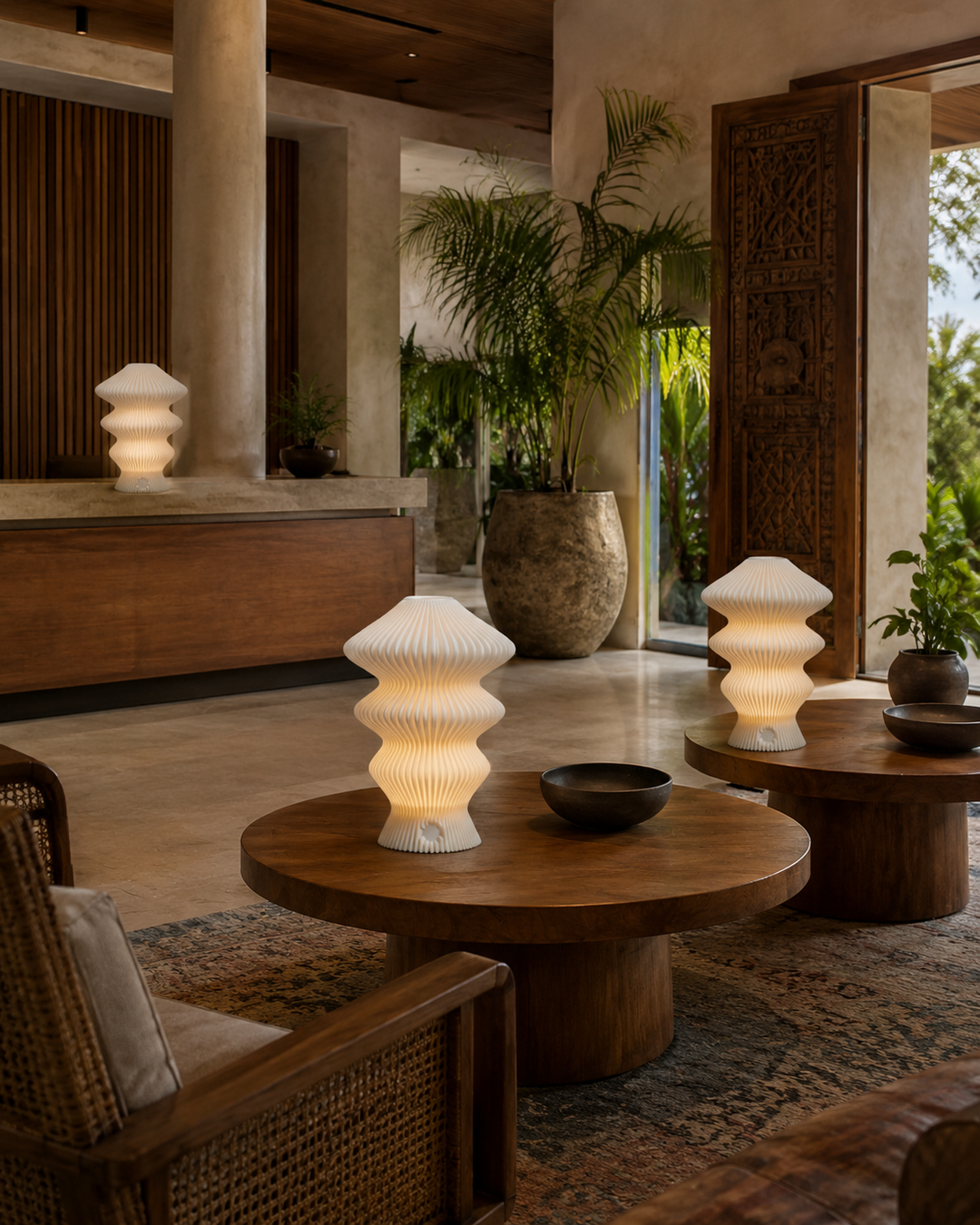White Muvèlo Ruvaa Mono lamps glowing across a boutique hotel lobby