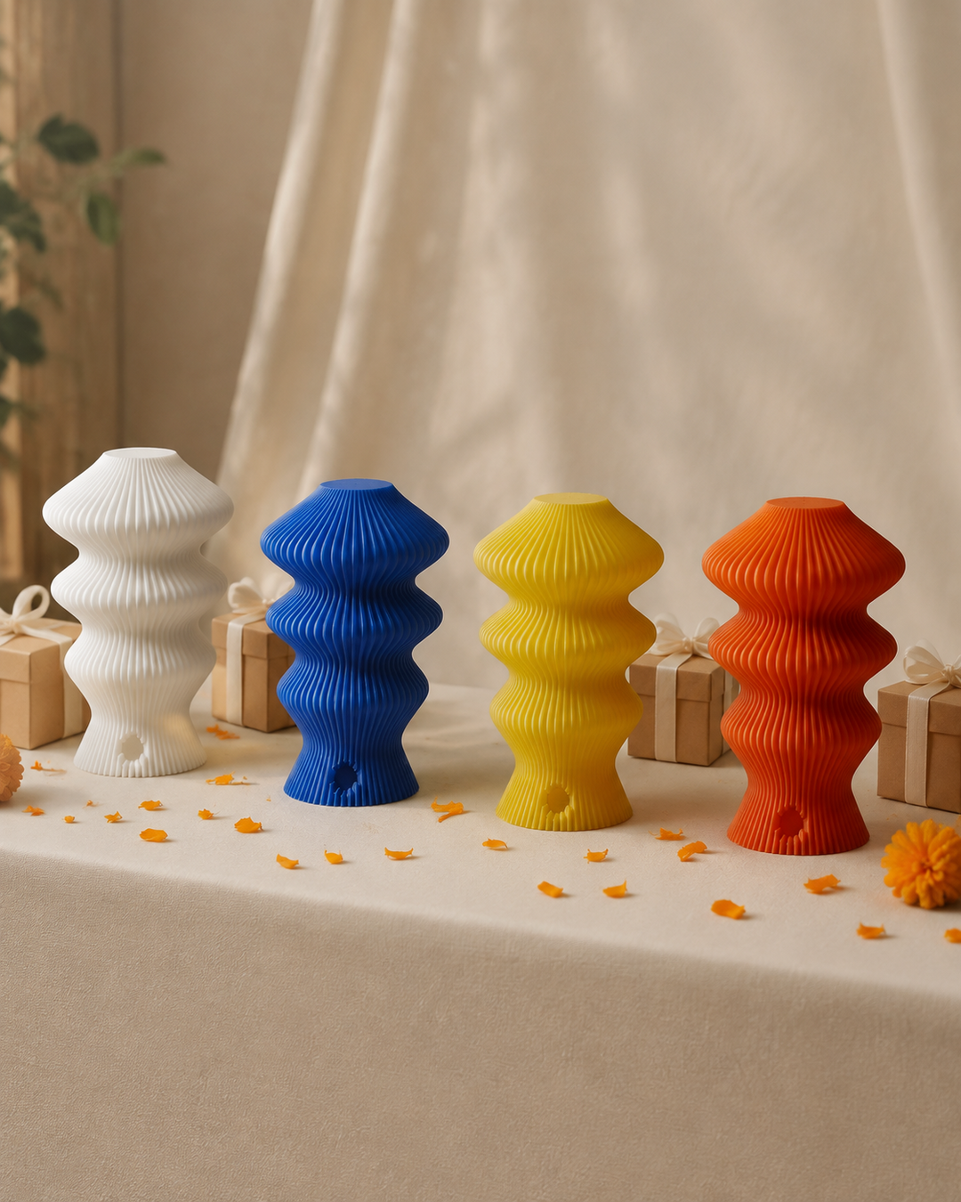 Four coloured Muvèlo Ruvaa Mono lamps arranged as useful wedding return gifts