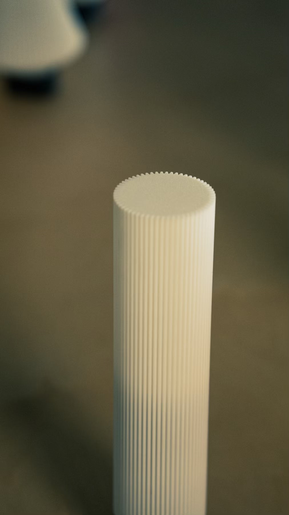 Muvèlo Tratto White portable rechargeable table lamp with a sculptural ribbed form.