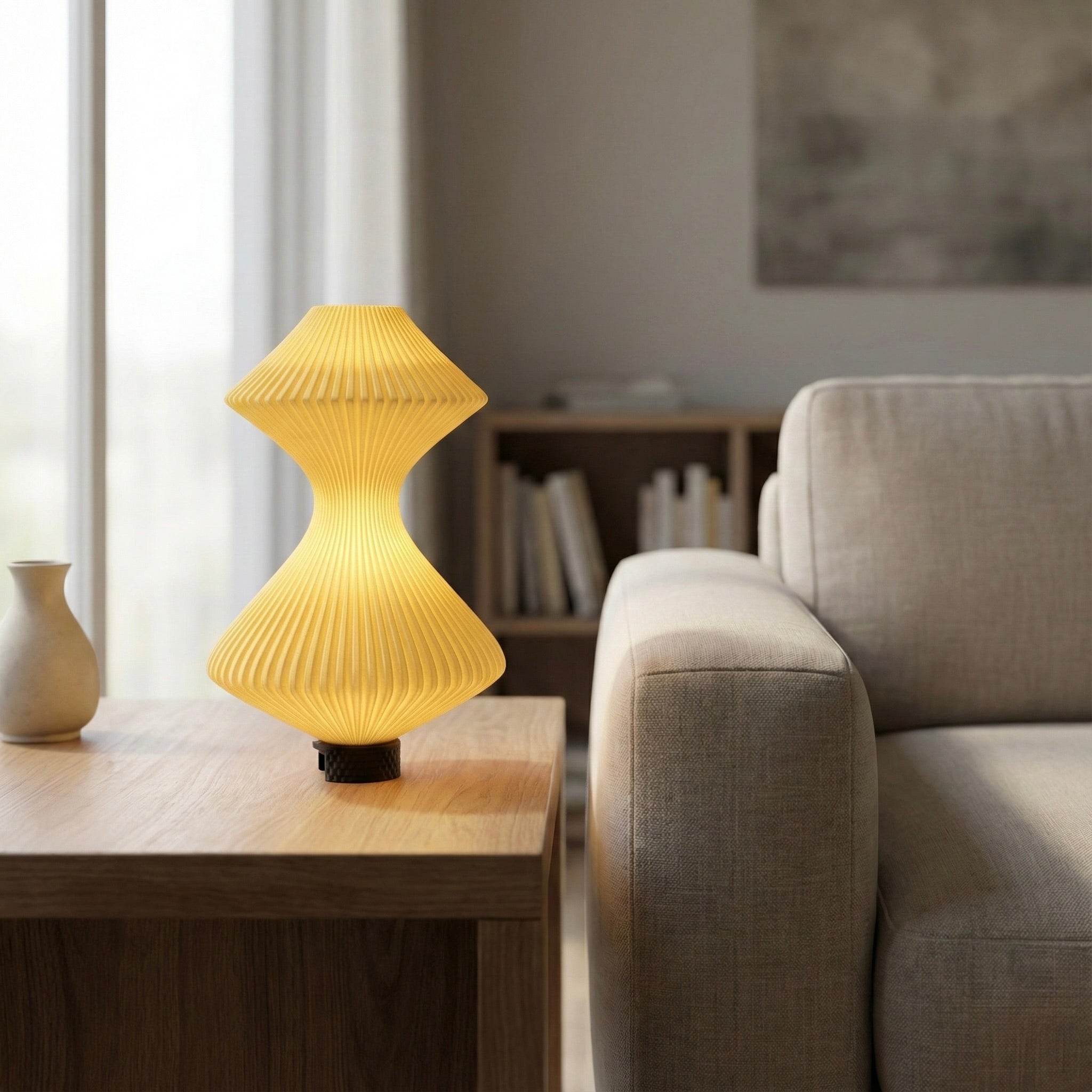 Yellow table lamp on a wooden side table in a living room setting.
