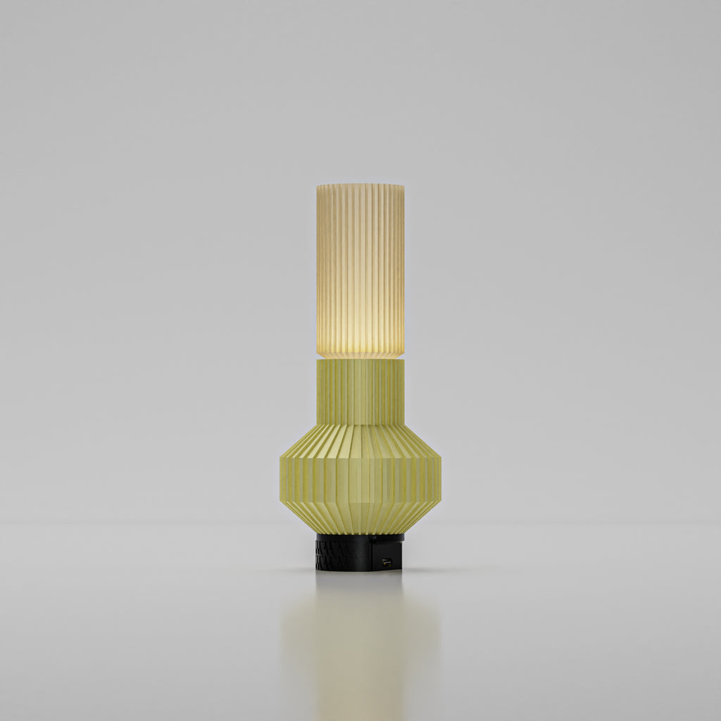Decorative lamp with ribbed design on a gray background