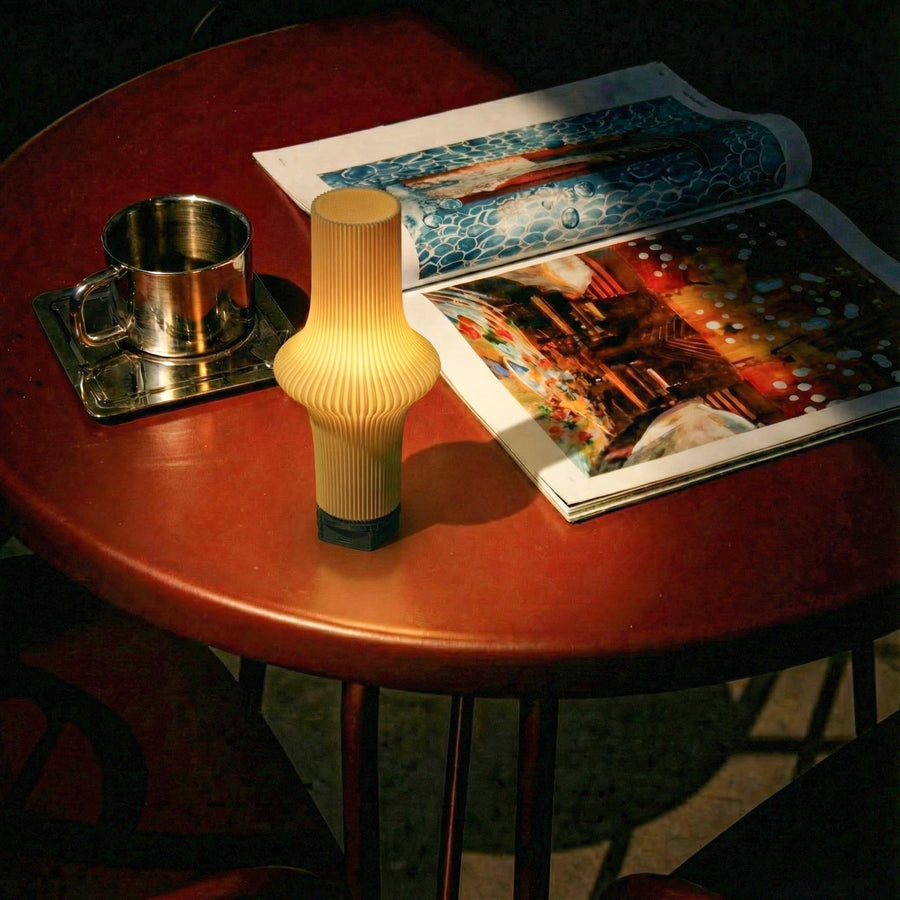 Zeya Butter button control rechargeable table lamp switched on