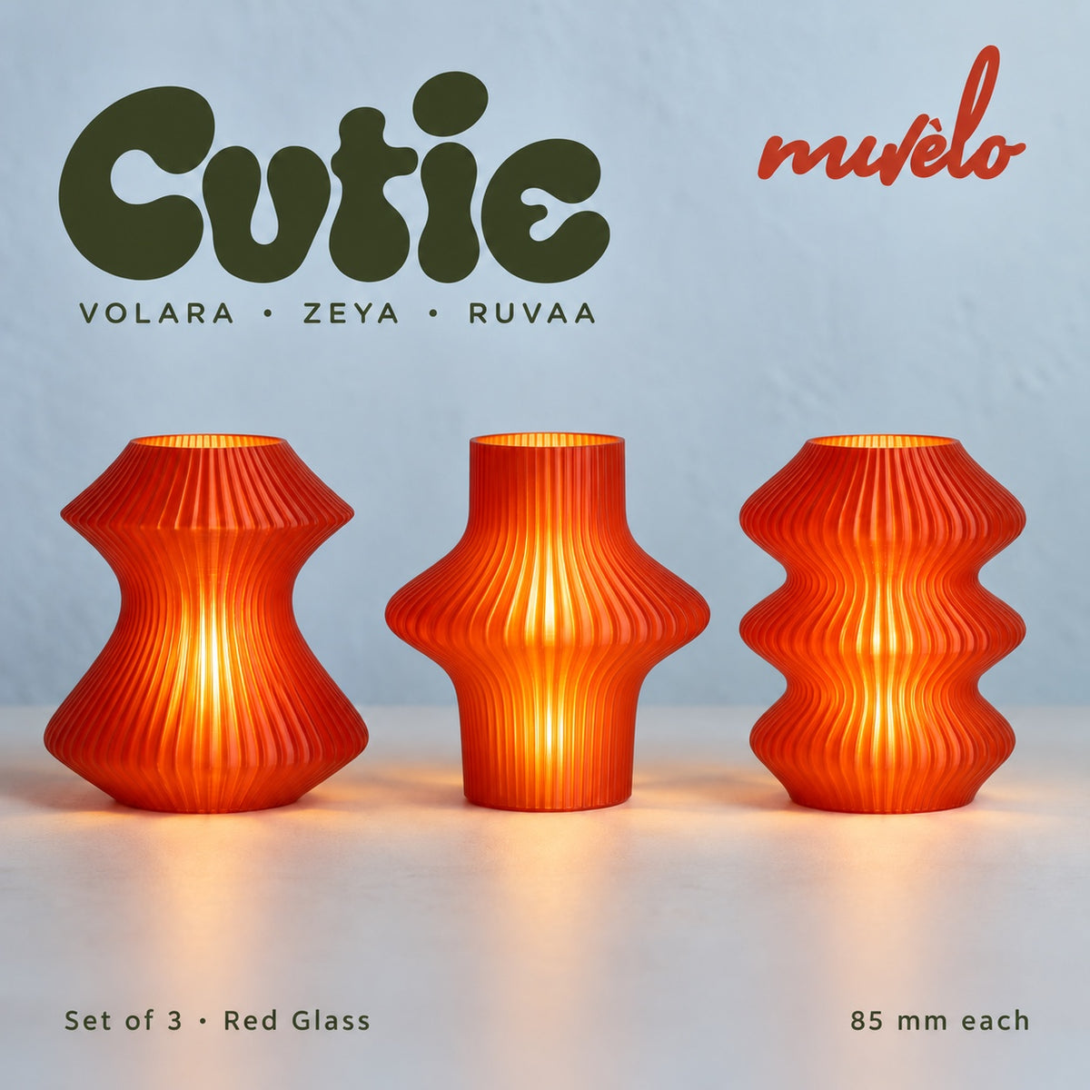 Muvèlo Cutie set of three in Red Glass: Volara, Zeya, Ruvaa, all illuminated and shown together.