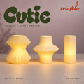 Muvèlo Cutie set of three in Butter: Volara, Zeya, Tratto, all illuminated and shown together.