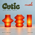 Muvèlo Cutie set of three in Red Glass: Zeya, Ruvaa, Tratto, all illuminated and shown together.