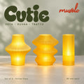 Muvèlo Cutie set of three in Yellow Glass: Zeya, Ruvaa, Tratto, all illuminated and shown together.