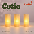 Muvèlo Cutie set of three in Butter: Tratto, Tratto, Tratto, all illuminated and shown together.