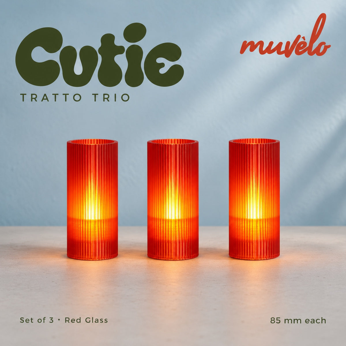 Muvèlo Cutie set of three in Red Glass: Tratto, Tratto, Tratto, all illuminated and shown together.