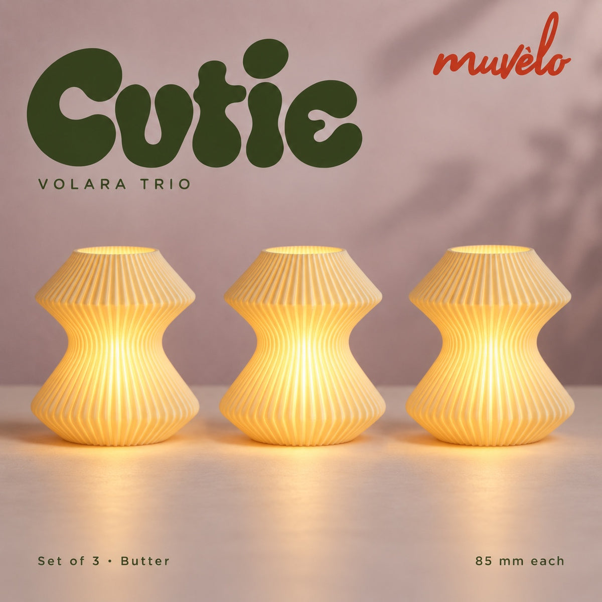 Muvèlo Cutie set of three in Butter: Volara, Volara, Volara, all illuminated and shown together.