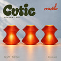 Muvèlo Cutie set of three in Red Glass: Volara, Volara, Volara, all illuminated and shown together.