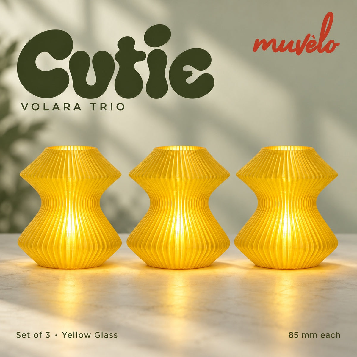Muvèlo Cutie set of three in Yellow Glass: Volara, Volara, Volara, all illuminated and shown together.