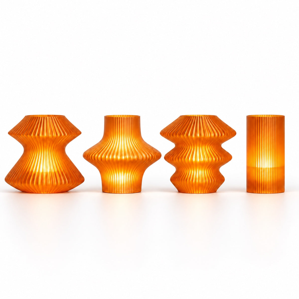 Front view of the Cutie Orange Glass Complete Set of 4: Volara, Zeya, Ruvaa and Tratto.