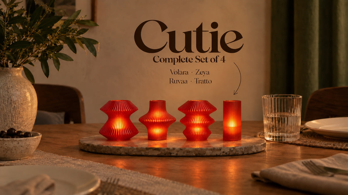 Muvèlo Cutie Complete Set of 4 in Red Glass: Volara, Zeya, Ruvaa and Tratto, all illuminated.